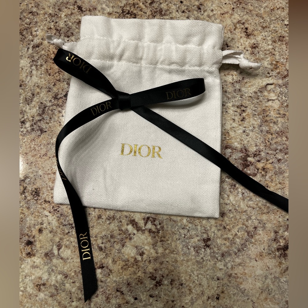 Dior Cream Pouch with Black and Gold  ribbon